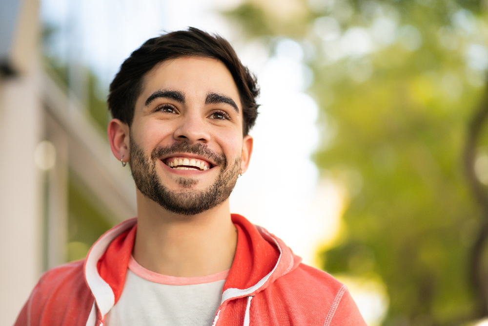 man smiling after mental health treatment