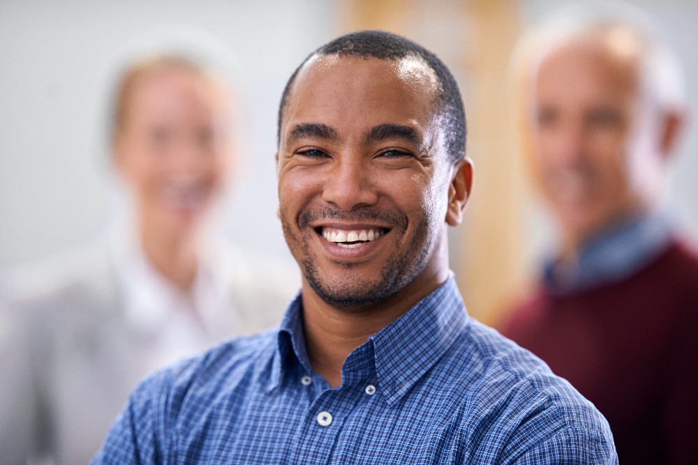 man smiling after cbt therapy