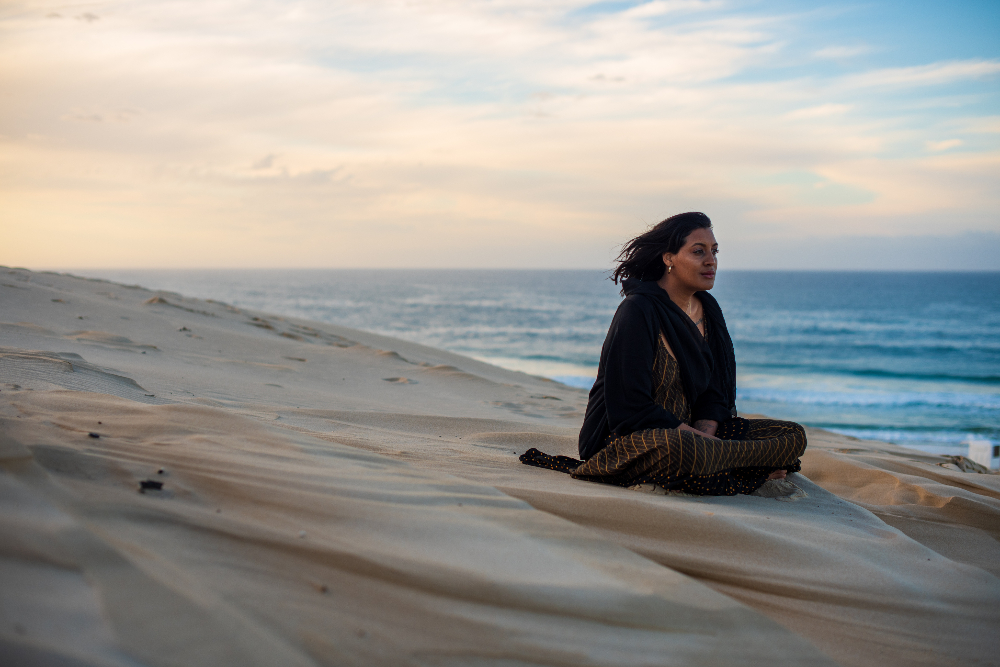 woman practicing minduflness outside