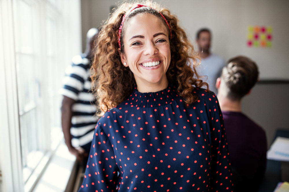 woman smiling after behavior modification