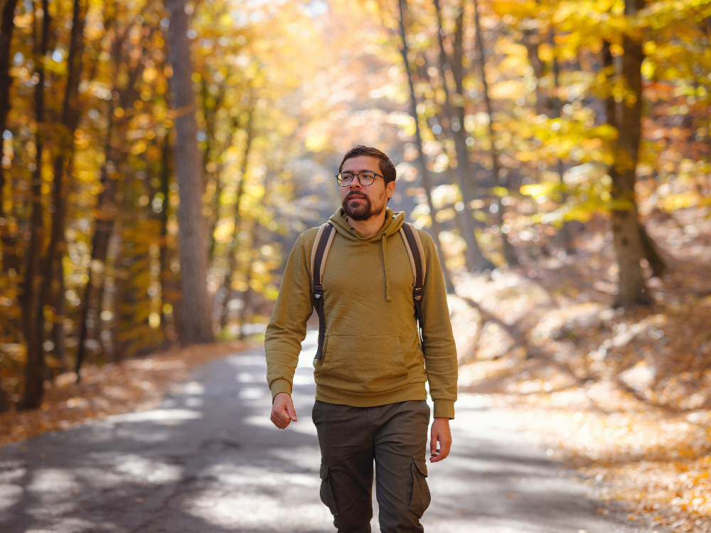 young man with major depressive disorder hiking in sacramento