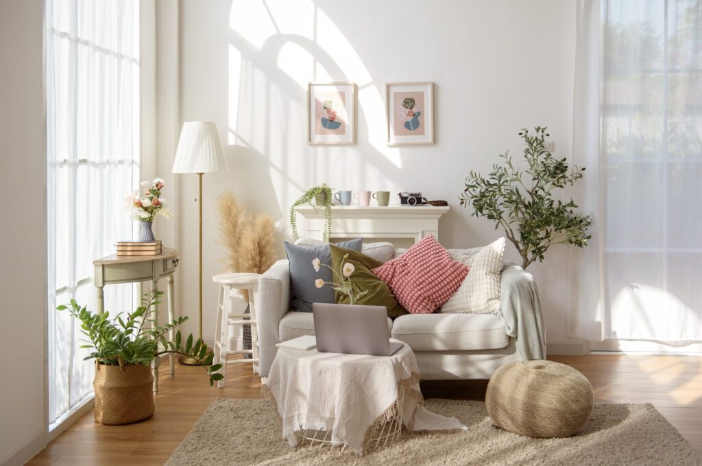 A bright, calm living room with soft natural light and comfortable seating
